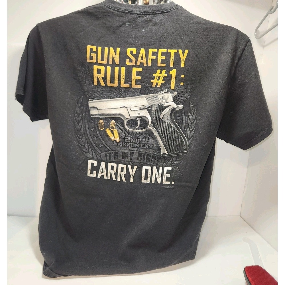 Buck‎ Wear Tee Shirt - Gun Safety Rule #1  Carry One - Size L Black short sleeve